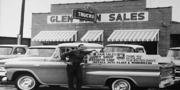 Vintage photo of Glen Sain Sales in Rector, Arkansas, with a GMC pickup out front
